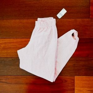 NWT Vintage Clio Coral pink houndstooth leggings with stirrups. Size SP.